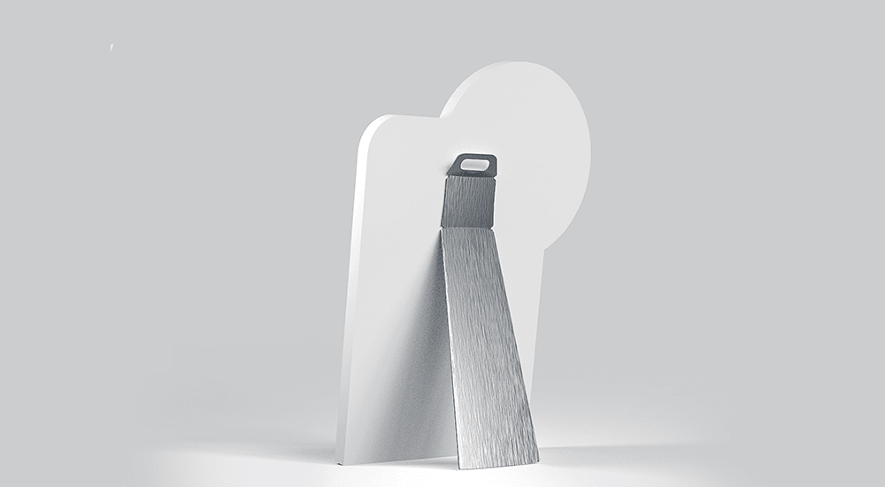 Cut-out figure with aluminium base feet for freestanding display placement