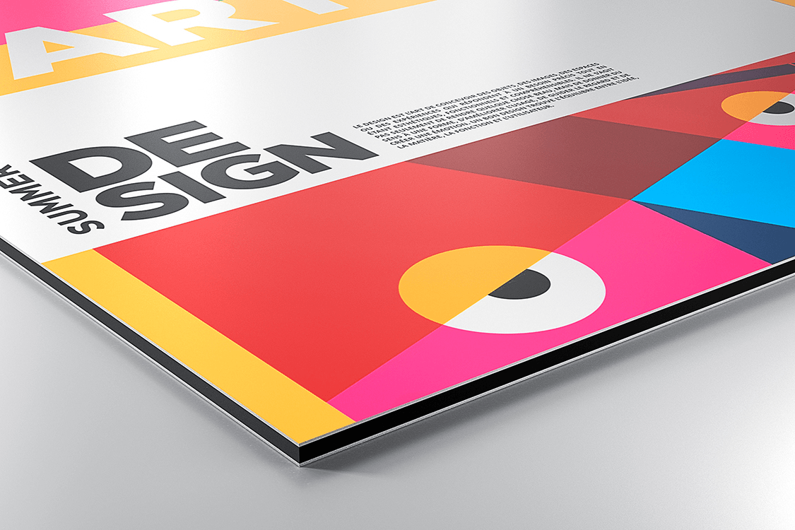 Corner view of white dibond panel printed with bold colorful design poster, showing thin aluminium composite structure with black core