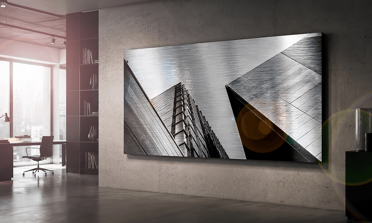 Architecture photography on brushed silver dibond showing geometric building angles in a modern office with concrete walls