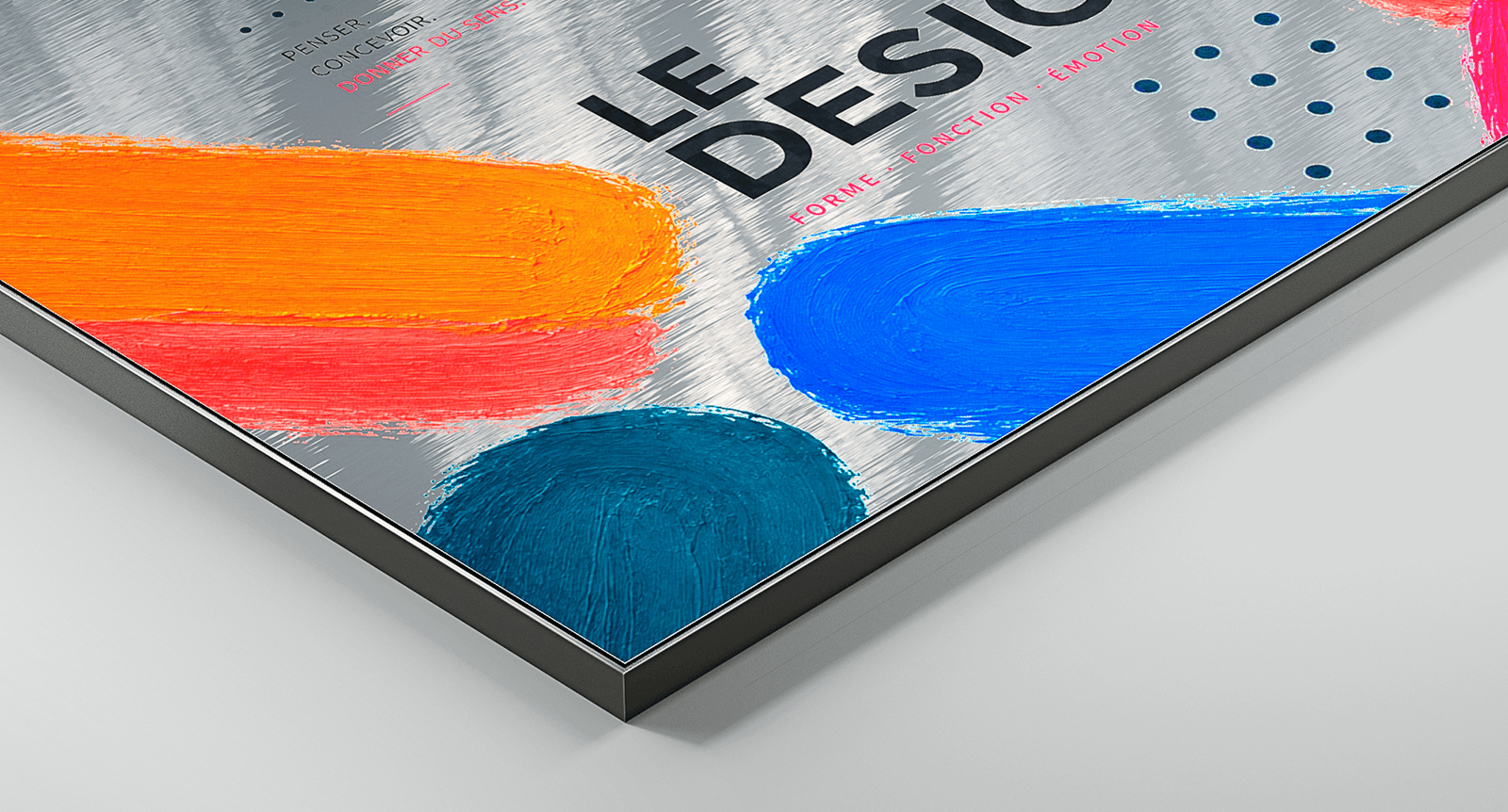 Corner detail of Dibond Silver print showing brushed metallic surface with colourful artwork and slim black frame