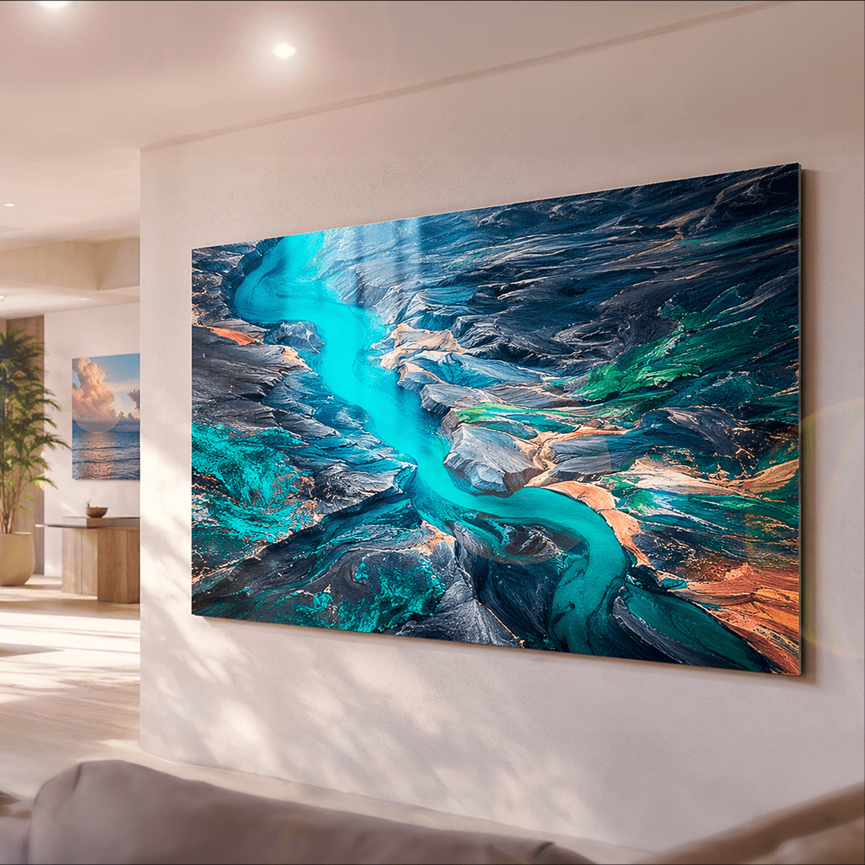 ChromaLuxe metal print of a turquoise glacial river through volcanic terrain, displayed in a sunlit contemporary living room with ocean view