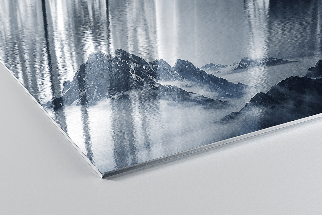 ChromaLuxe Brushed aluminium panel with misty mountain landscape in cool grey-blue tones, visible brushed texture creates distinctive metallic sheen