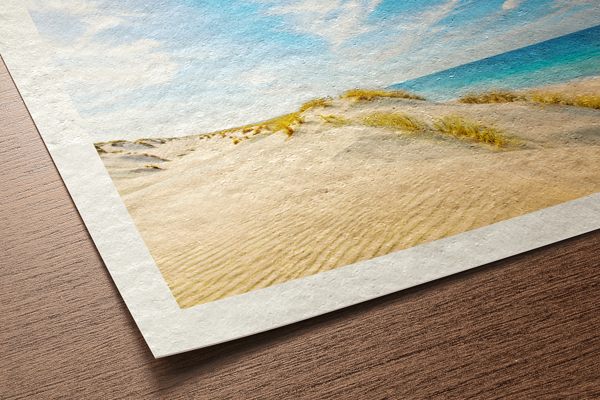 Close-up of Torchon fine art paper showing its coarse, expressive felt texture and bright white surface