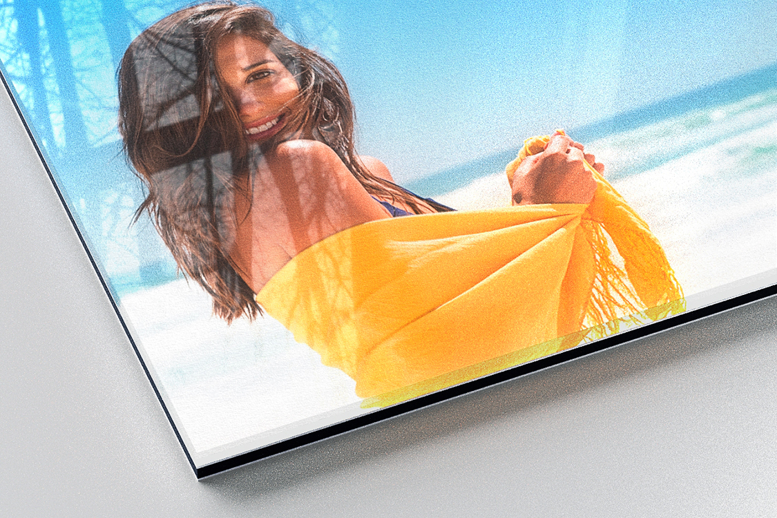 Fine art print with glossy acrylic face-mount finish showing beach portrait with vibrant colors