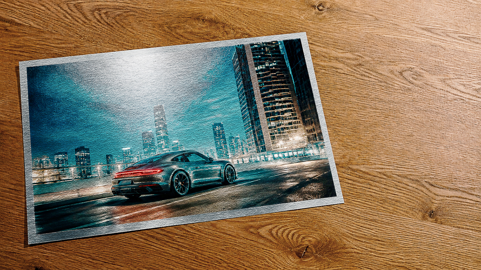 Metallic fine art print of sports car at night with city skyline, showing pearlescent surface effect