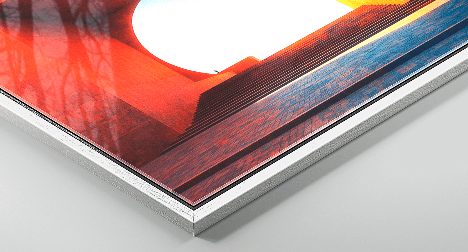 Corner detail of FinoArt print with white wood frame showing layered construction and premium finish