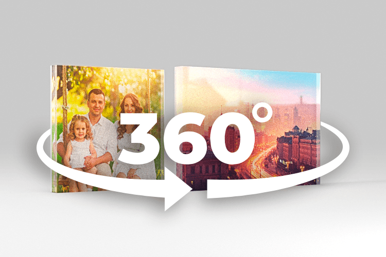 Two Acrylux Block photo prints showing a family portrait and city skyline, displayed as freestanding acrylic objects